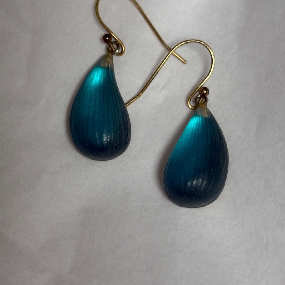 Alexis Bittar dew drop earrings.